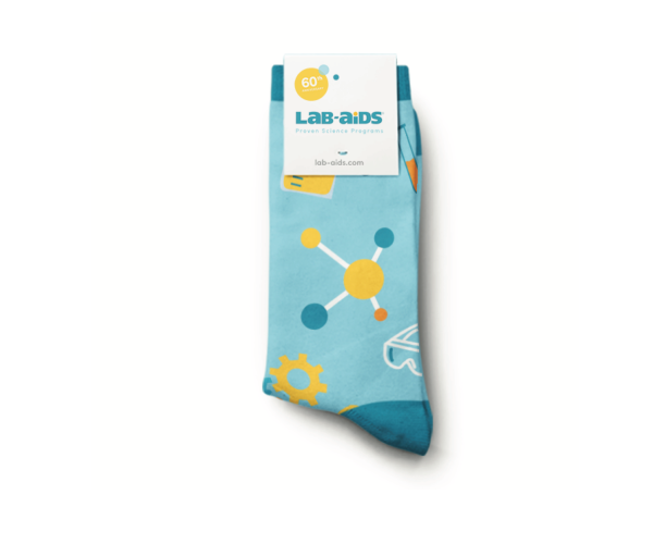 Folded teal dress socks with science related icons on them. The tag reads, "Lab-Aids, 60th anniversary"